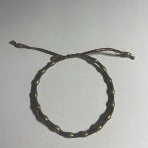 Tai brown waxed cord adjustable bracelet with brass metal beads